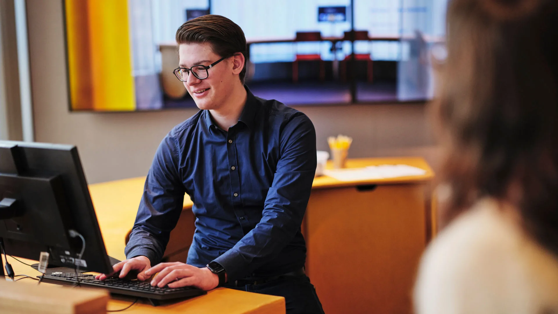 Museum staff working at the entrance.