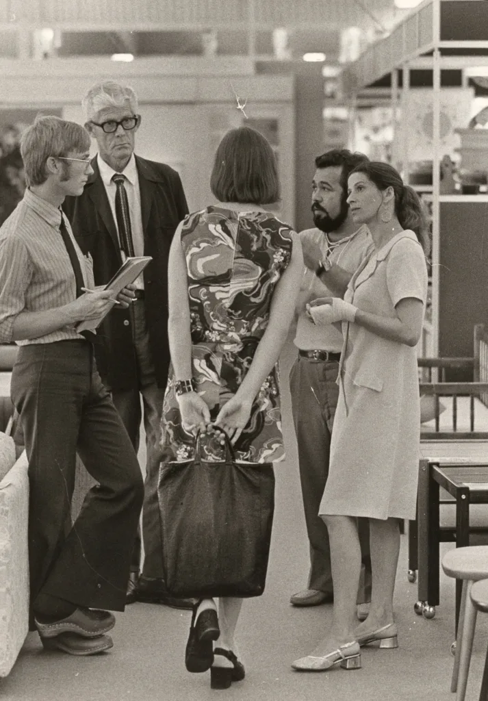 A group of people in a store.